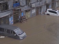 Trung Quốc nâng mức cảnh báo vàng về lũ lụt, phía bắc lạnh bất thường vào mùa hè